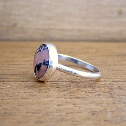 a side view of the Bloom ring to show the low profile of the stone and polished smooth slim band