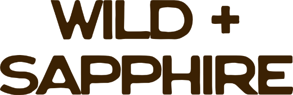 Logo with 'WILD + SAPPHIRE' text in brown on a white background