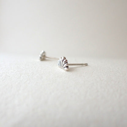 side view of handmade lotus flower earrings to show depth of metal used (i.e. 3D design, not thin)